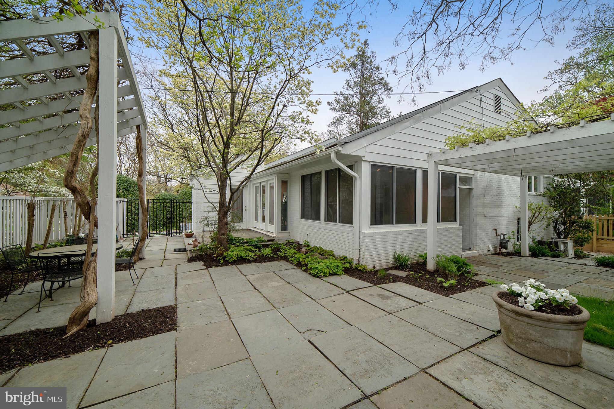 4929 Jamestown Road Bethesda, MD 20816 - Photo 5 of 39 Sunroom from front patio