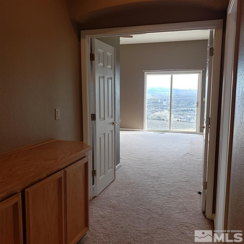 986 University Place Reno, NV 89512 - Photo 20 of 25 a view of a room that has a sink and wooden floor
