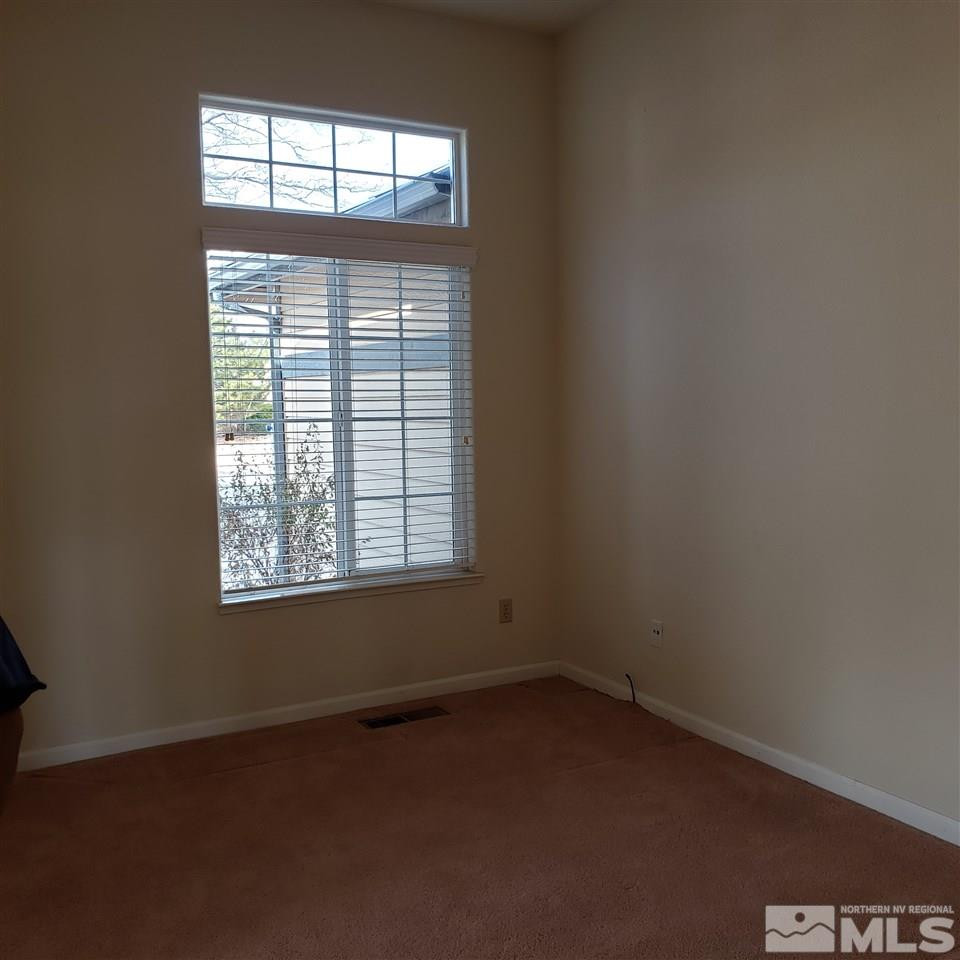 986 University Place Reno, NV 89512 - Photo 21 of 25 an empty room with a window