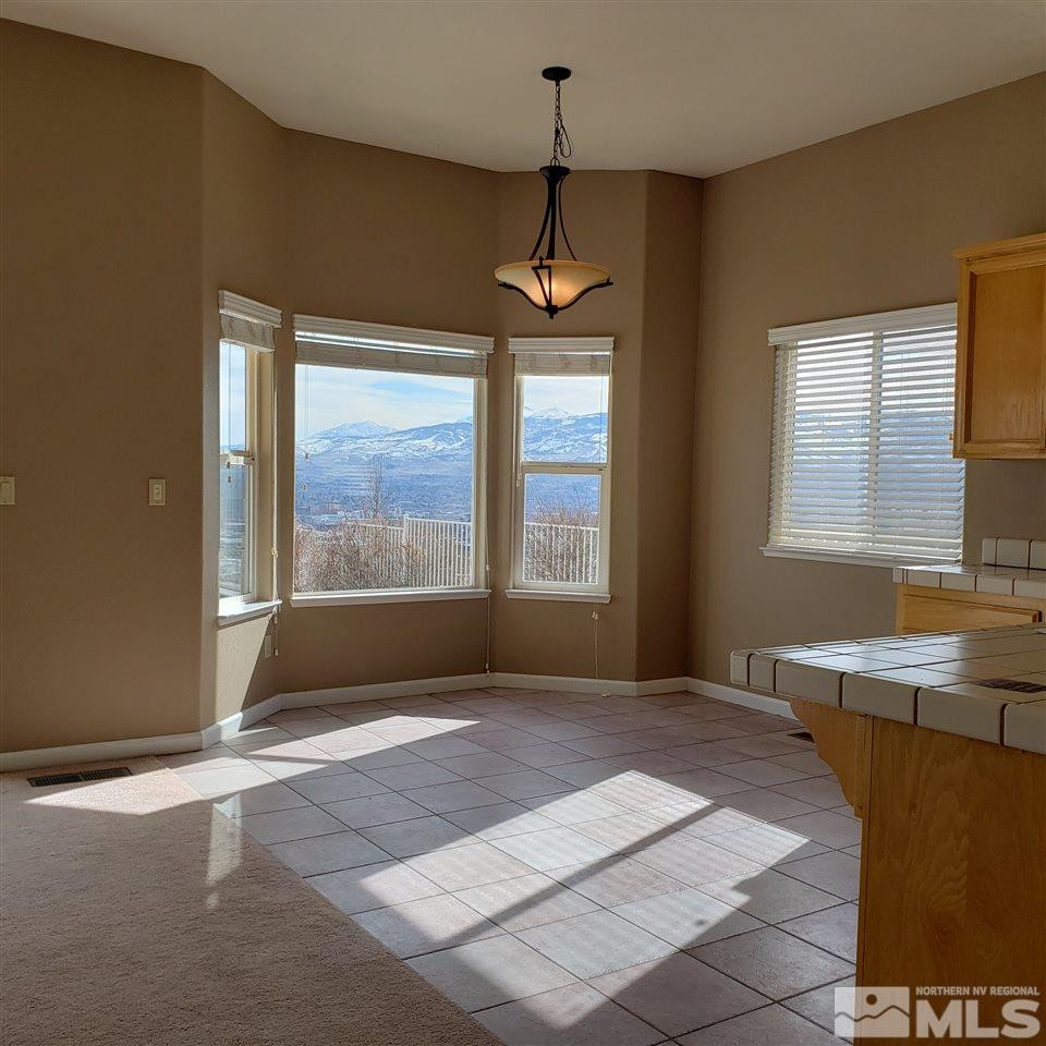 986 University Place Reno, NV 89512 - Photo 10 of 25 a view of an empty room with a window