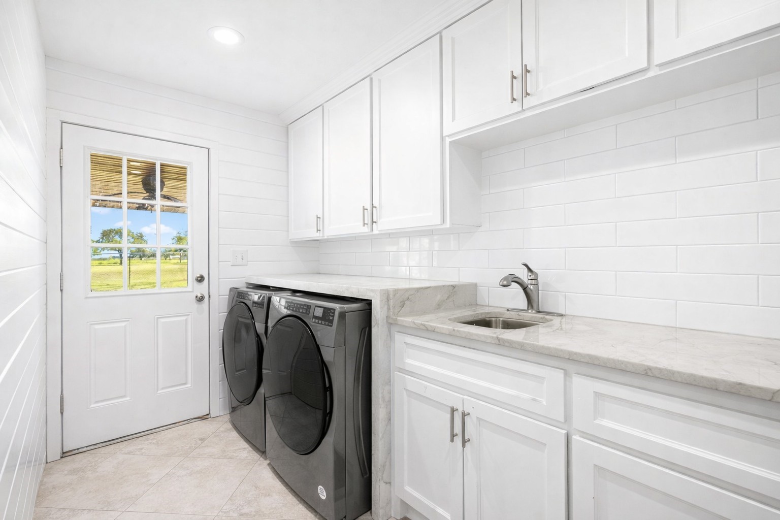 3148 FM 333 Road Garwood, TX 77442 - Photo 16 of 39 a utility room with sink dryer and washer
