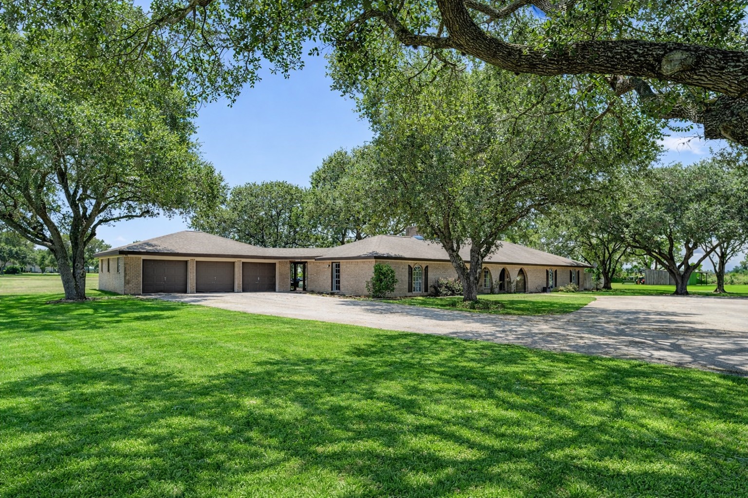 3148 FM 333 Road Garwood, TX 77442 - Photo 2 of 39 a front view of house with yard and green space