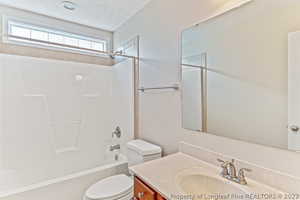 75 Hayden Lane Cameron, NC 28326 - Photo 22 of 35 a bathroom with a sink toilet and shower
