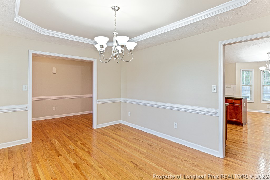 75 Hayden Lane Cameron, NC 28326 - Photo 7 of 35 a view of livingroom with hardwood floor and ceiling fan