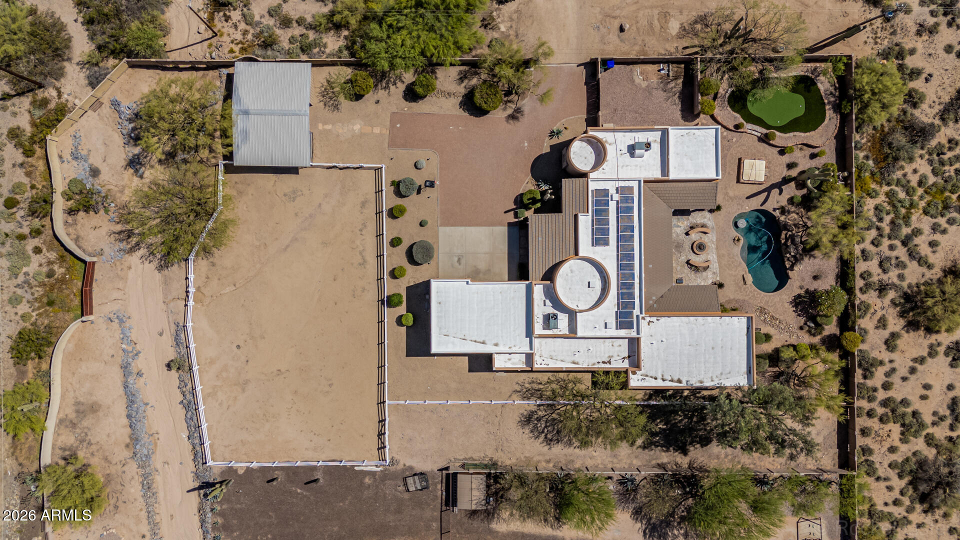 6033 East Lone Mountain Road Cave Creek, AZ 85331 - Photo 3 of 77 an aerial view of residential house with outdoor space and parking