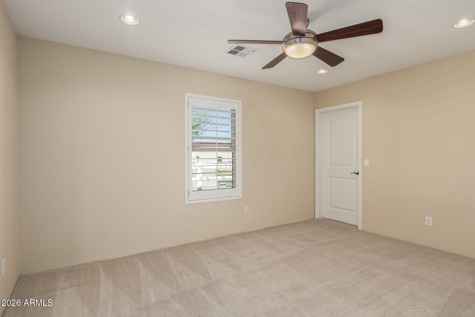 6033 East Lone Mountain Road Cave Creek, AZ 85331 - Photo 36 of 77 a view of an empty room with a window