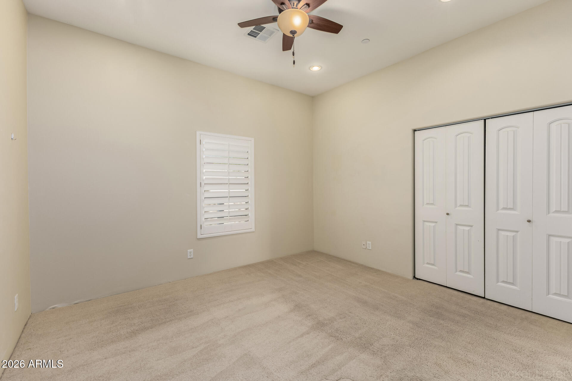 6033 East Lone Mountain Road Cave Creek, AZ 85331 - Photo 42 of 77 a view of an empty room with a window