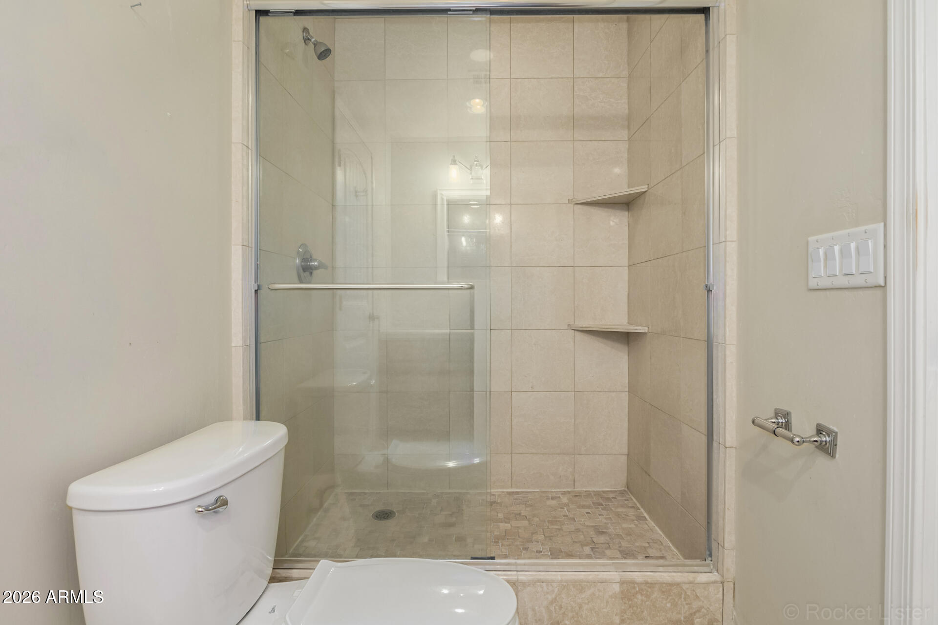 6033 East Lone Mountain Road Cave Creek, AZ 85331 - Photo 44 of 77 a bathroom with a shower and toilet