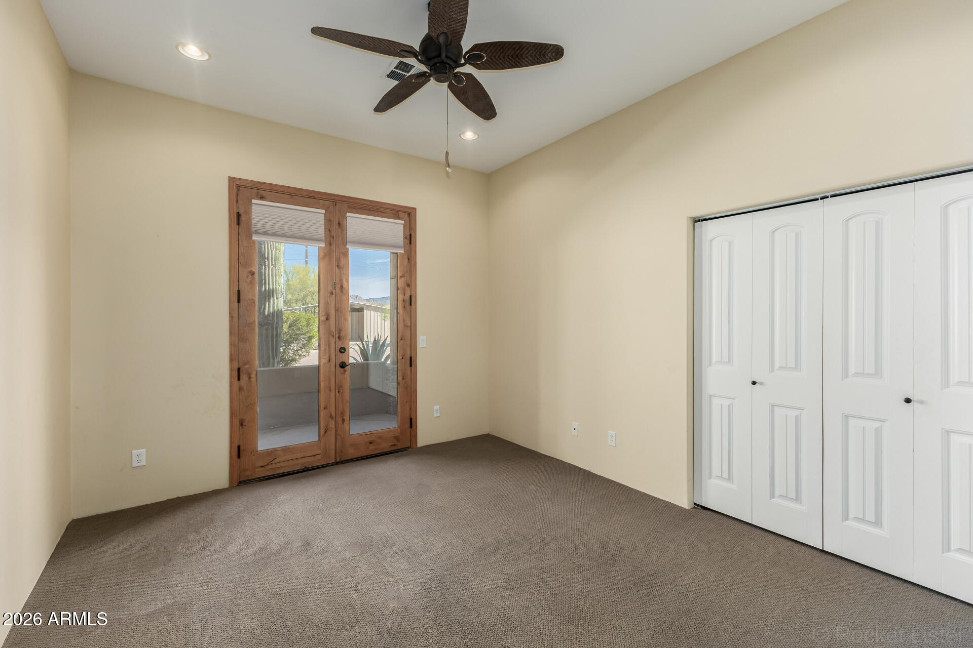 6033 East Lone Mountain Road Cave Creek, AZ 85331 - Photo 46 of 77 a view of an empty room with a window