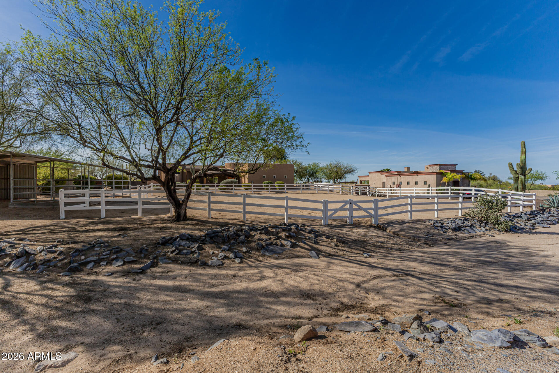 6033 East Lone Mountain Road Cave Creek, AZ 85331 - Photo 64 of 77 a view of a yard with wooden fence