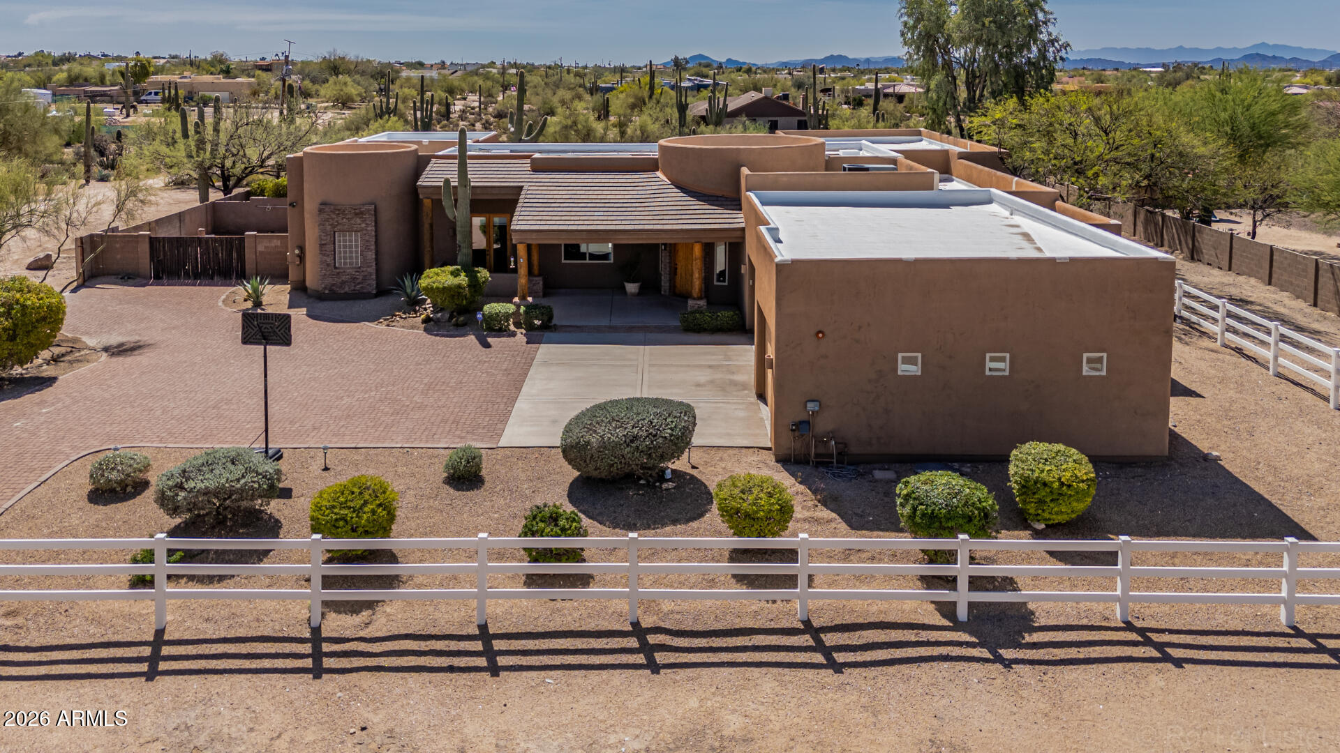 6033 East Lone Mountain Road Cave Creek, AZ 85331 - Photo 69 of 77 an aerial view of a house with garden space and street view