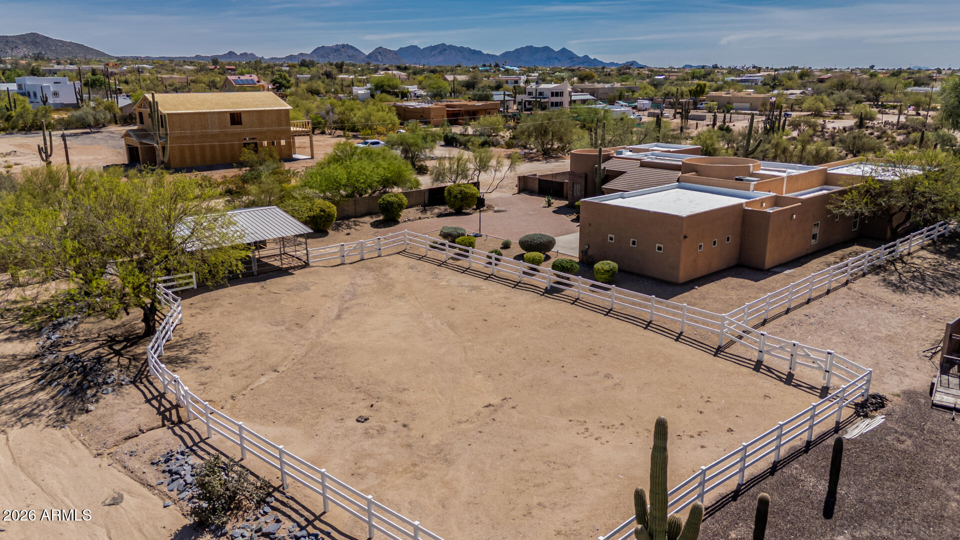 6033 East Lone Mountain Road Cave Creek, AZ 85331 - Photo 71 of 77 an aerial view of a house with a yard
