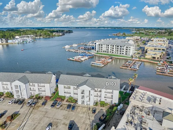 a bathroom with a sink mirror and toilet