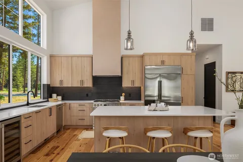 a kitchen with a sink and a stove