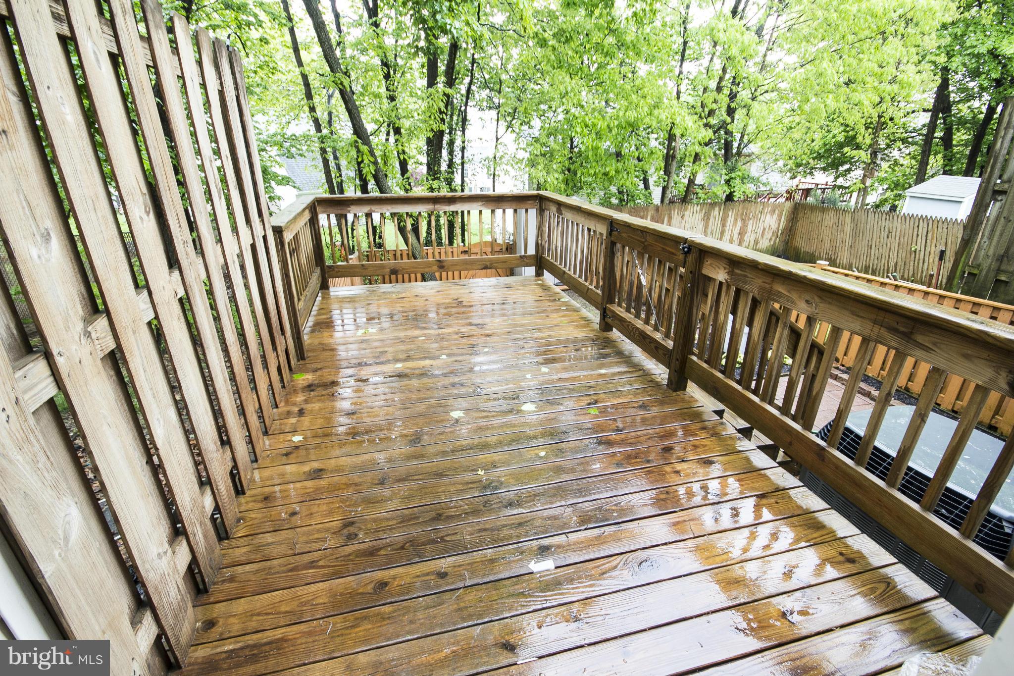 47 Robin Ridge Court Baltimore, MD 21234 - Photo 14 of 30 a view of balcony with wooden floor and fence