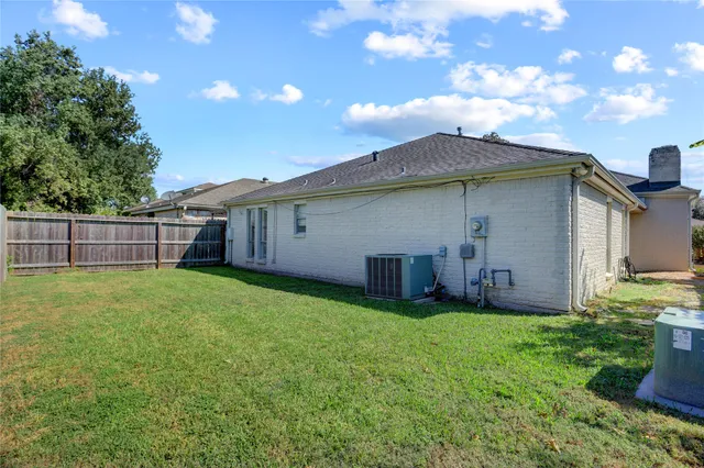 a view of a backyard with a garden