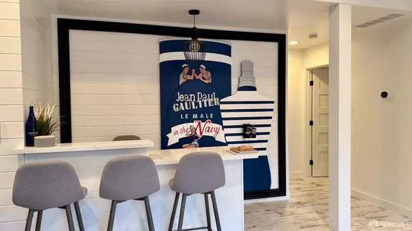 a balcony view with a dining table and a chairs