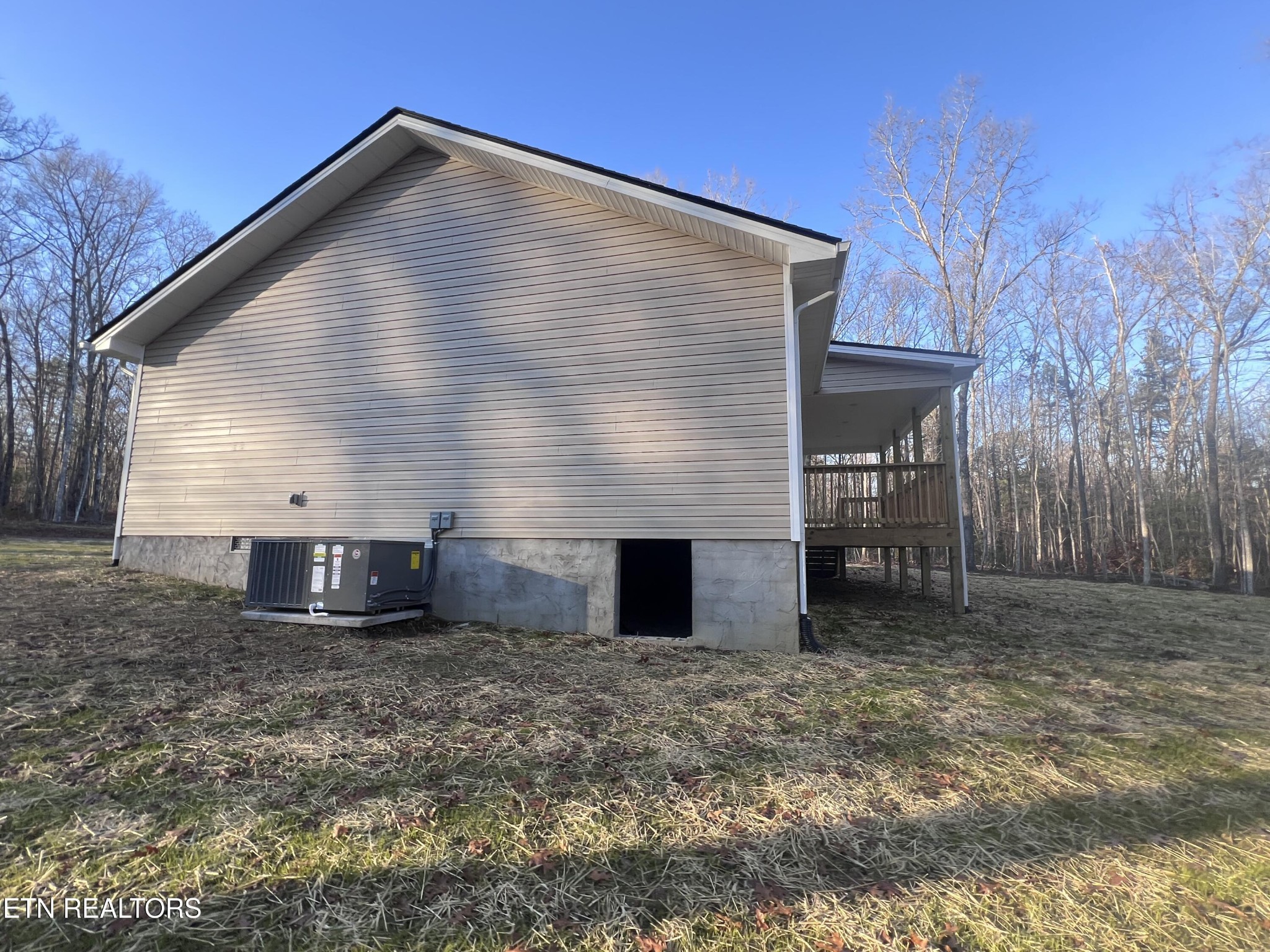 133 Jay Loop Jamestown, TN 38556 - Photo 31 of 33 a view of a house with a yard