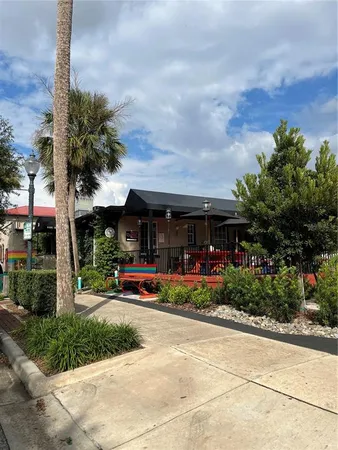 a view of street with parked cars