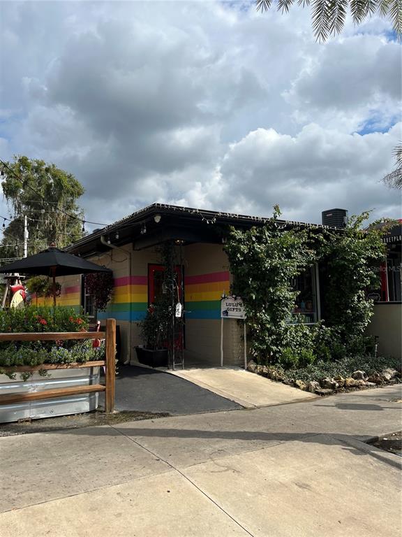 334 North Donnelly Street Mount Dora, FL 32757 - Photo 5 of 7 a front view of a house with a yard