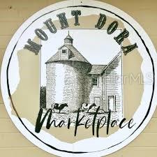 334 North Donnelly Street Mount Dora, FL 32757 - Photo 7 of 7 a view of entryway and hall with wooden floor