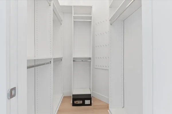 a view of a room that has a window in it