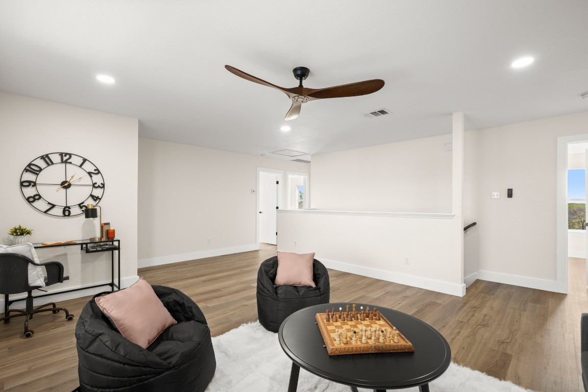 13625 Coomer Path Pflugerville, TX 78660 - Photo 14 of 22 a living room with furniture and a table