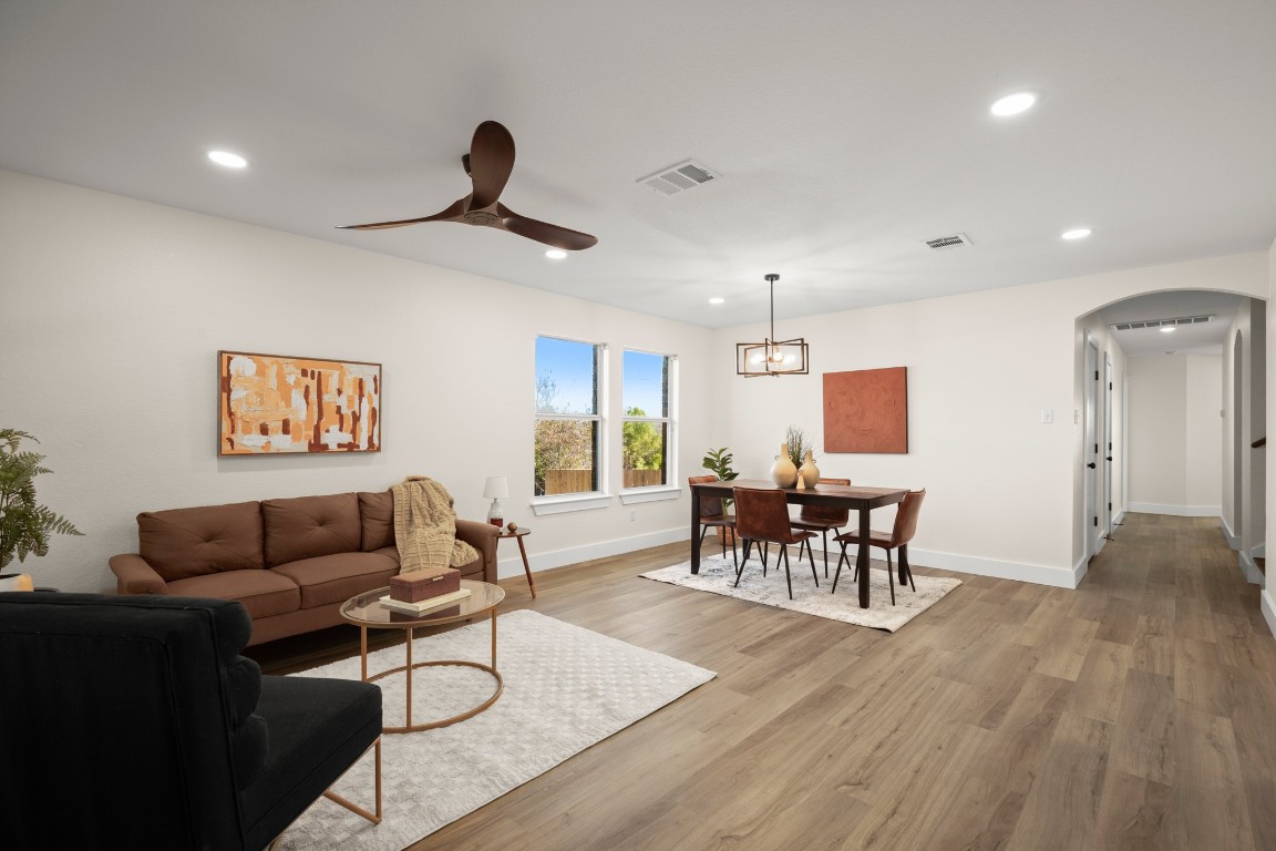 13625 Coomer Path Pflugerville, TX 78660 - Photo 7 of 22 a living room with furniture and a wooden floor