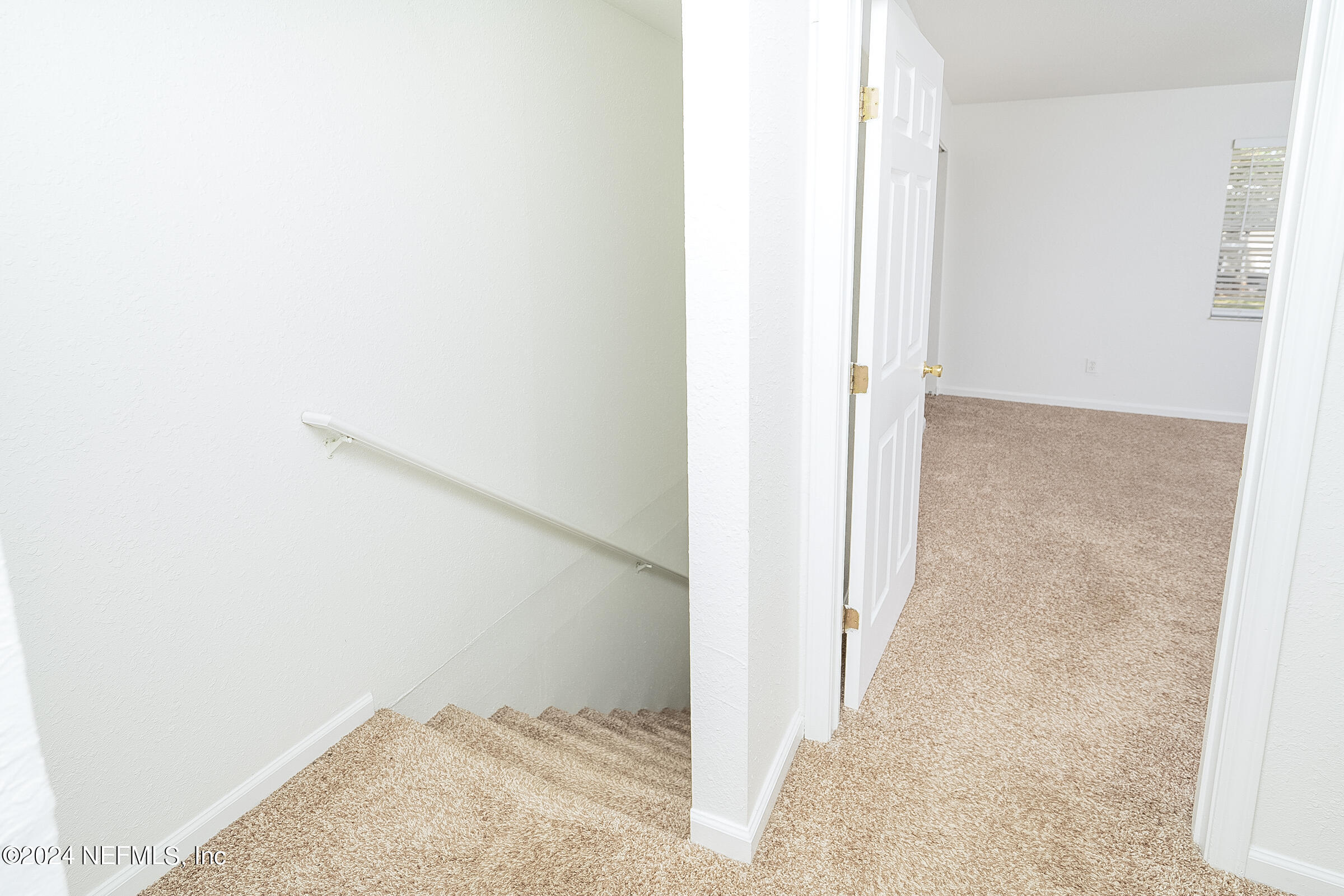 4420 Carter Road, Unit 52 St. Augustine, FL 32086 - Photo 20 of 34 a view of a room with a hallway