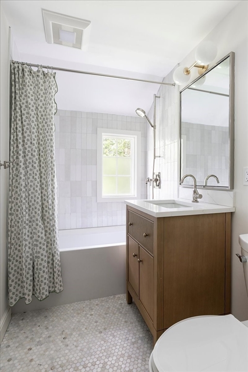 12 Meadowbrook Road Weston, MA 02493 - Photo 21 of 28 a bathroom with a sink a toilet and shower