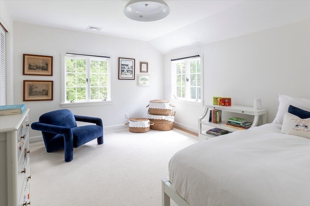 12 Meadowbrook Road Weston, MA 02493 - Photo 22 of 28 a bedroom with two beds and a window