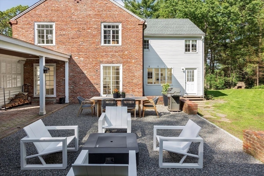12 Meadowbrook Road Weston, MA 02493 - Photo 26 of 28 front view of house with a yard