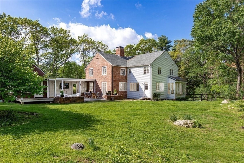 12 Meadowbrook Road Weston, MA 02493 - Photo 27 of 28 a front view of a house with garden