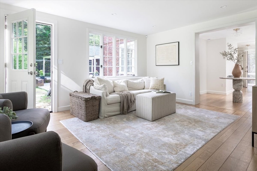 12 Meadowbrook Road Weston, MA 02493 - Photo 9 of 28 a living room with furniture and a large window