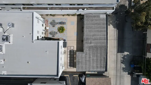 a kitchen with stainless steel appliances a refrigerator stove and sink