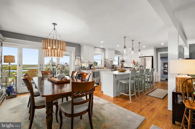 a bedroom with furniture and wooden floor