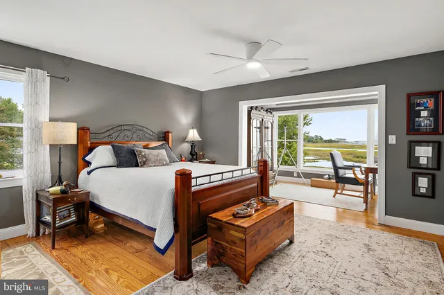 a view of a chair and table on the deck