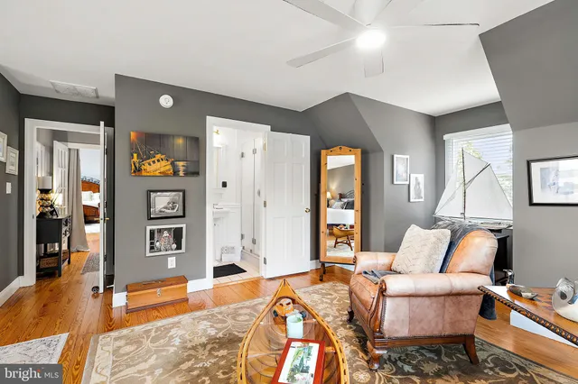 an aerial view of residential houses with outdoor space and swimming pool