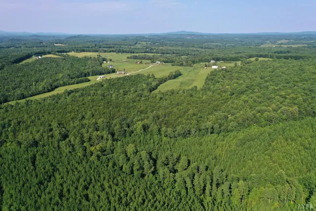 a view of a city with a lake