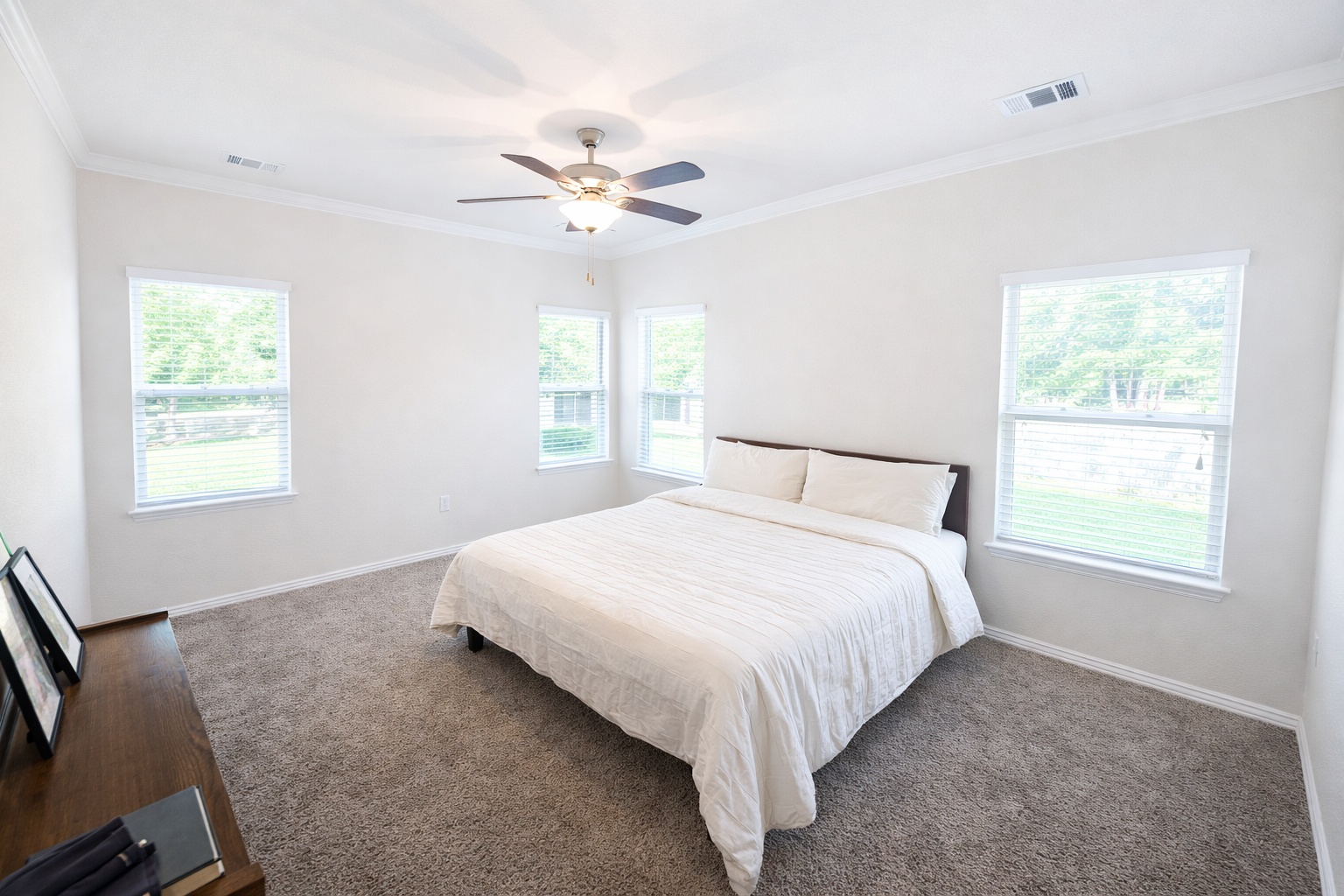 10012 Epic Knoll Drive Austin, TX 78747 - Photo 16 of 31 a bedroom with a bed and a window
