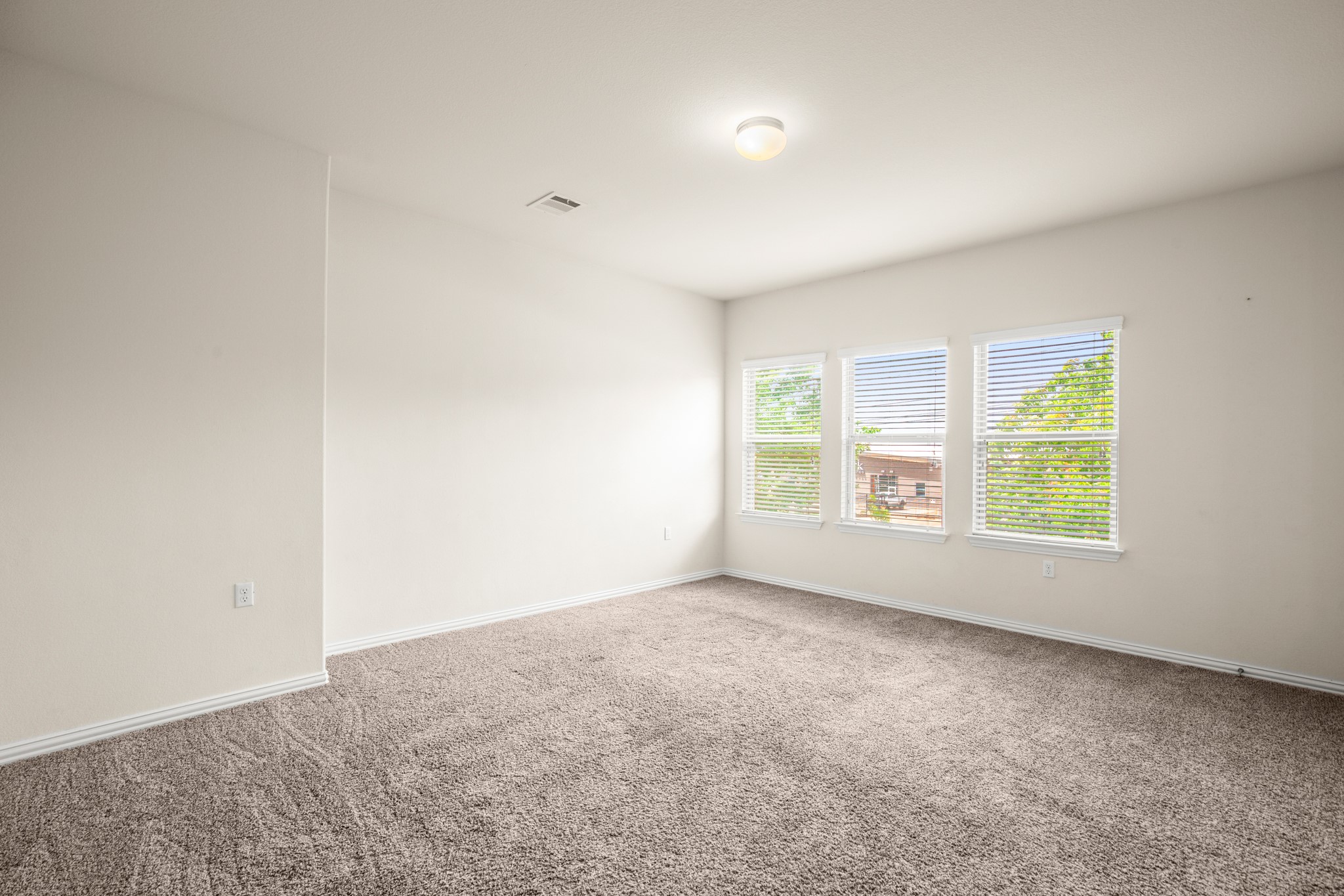 10012 Epic Knoll Drive Austin, TX 78747 - Photo 26 of 31 an empty room with windows