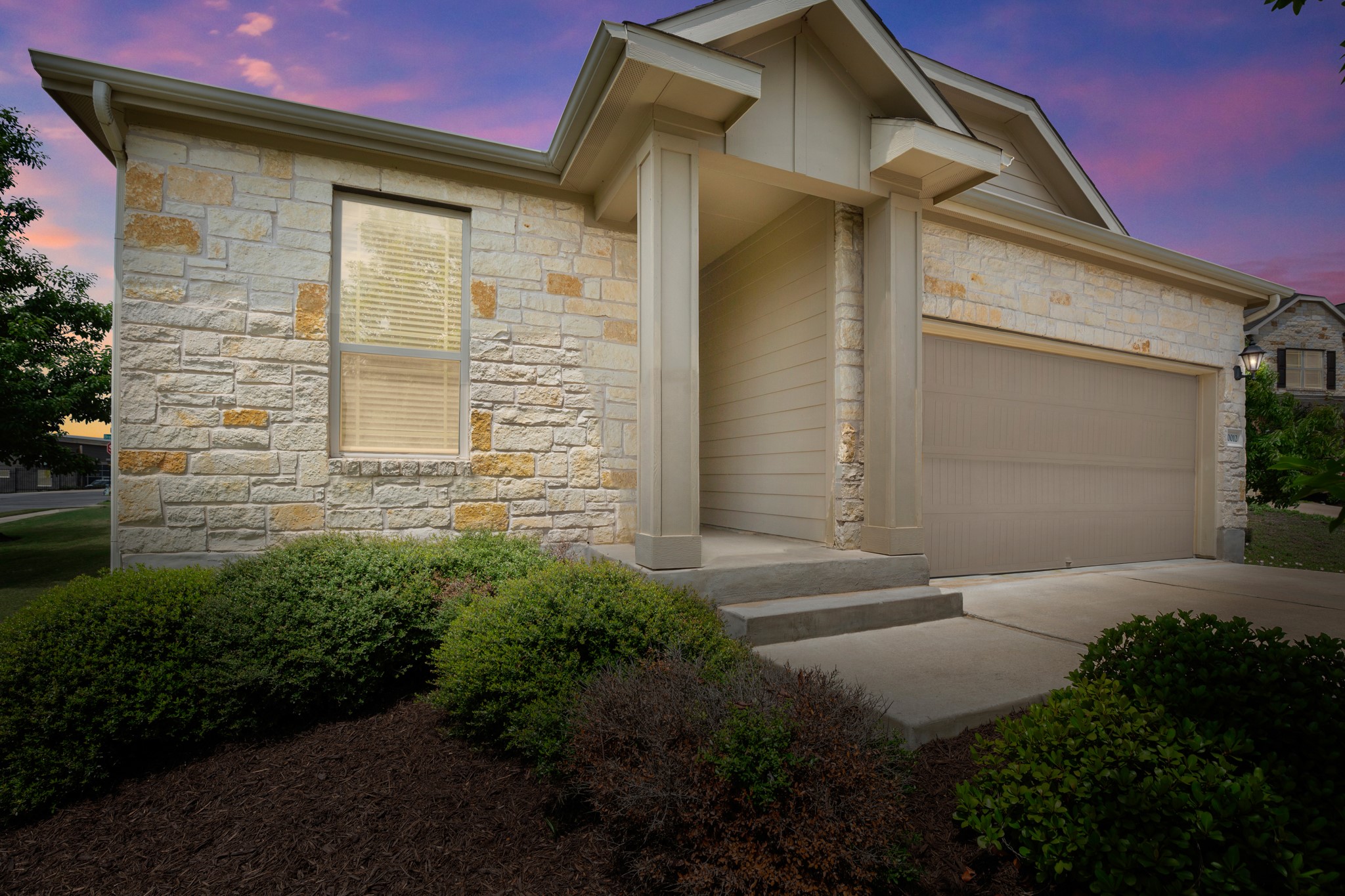 10012 Epic Knoll Drive Austin, TX 78747 - Photo 31 of 31 a front view of a house with a yard
