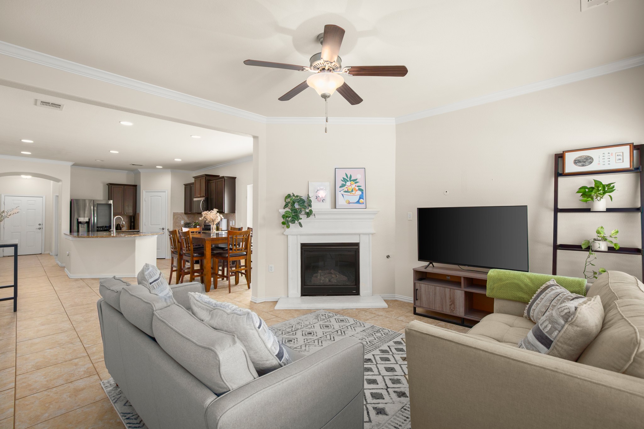 10012 Epic Knoll Drive Austin, TX 78747 - Photo 4 of 31 a living room with furniture and a flat screen tv