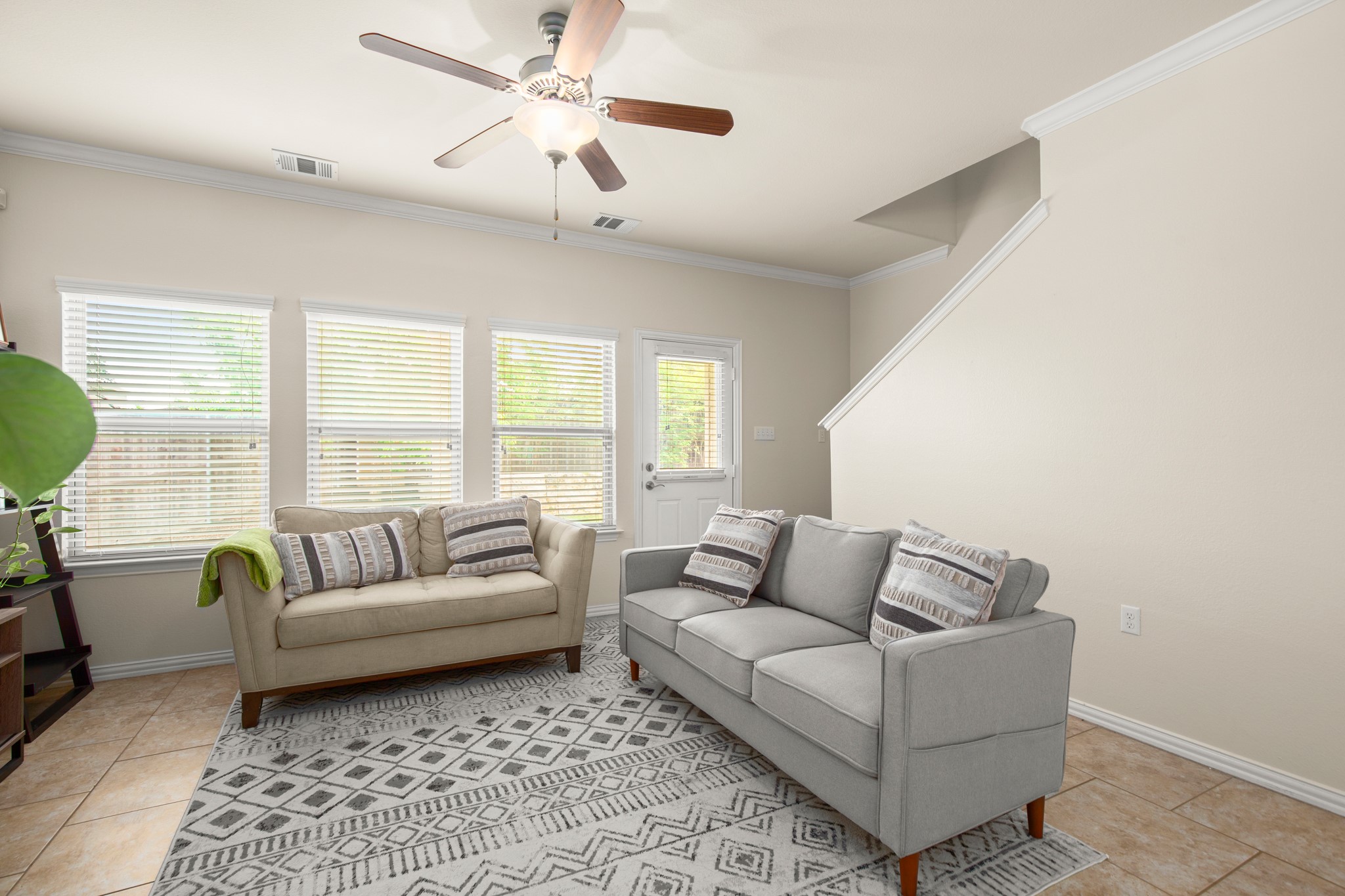 10012 Epic Knoll Drive Austin, TX 78747 - Photo 6 of 31 a living room with furniture and a large window