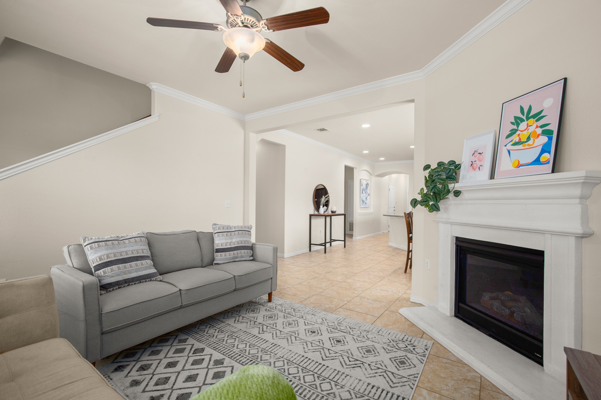 10012 Epic Knoll Drive Austin, TX 78747 - Photo 7 of 31 a living room with furniture and a fireplace