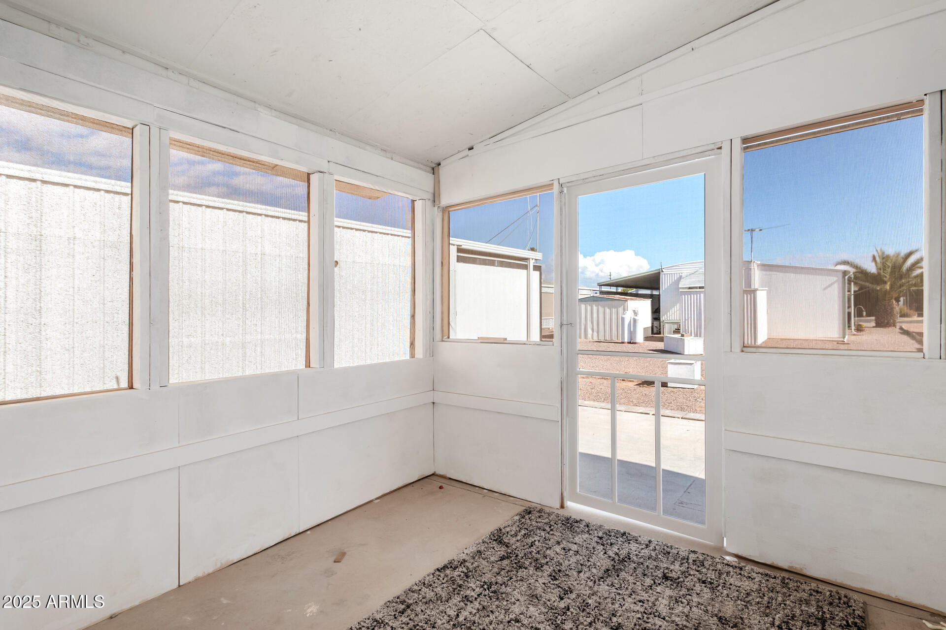 747 East Germann Road, Unit 67 San Tan Valley, AZ 85140 - Photo 23 of 25 Screened in Patio