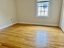 26 Bacon Street, Unit 26 Watertown, MA 02472 - Photo 6 of 12 an empty room with a window