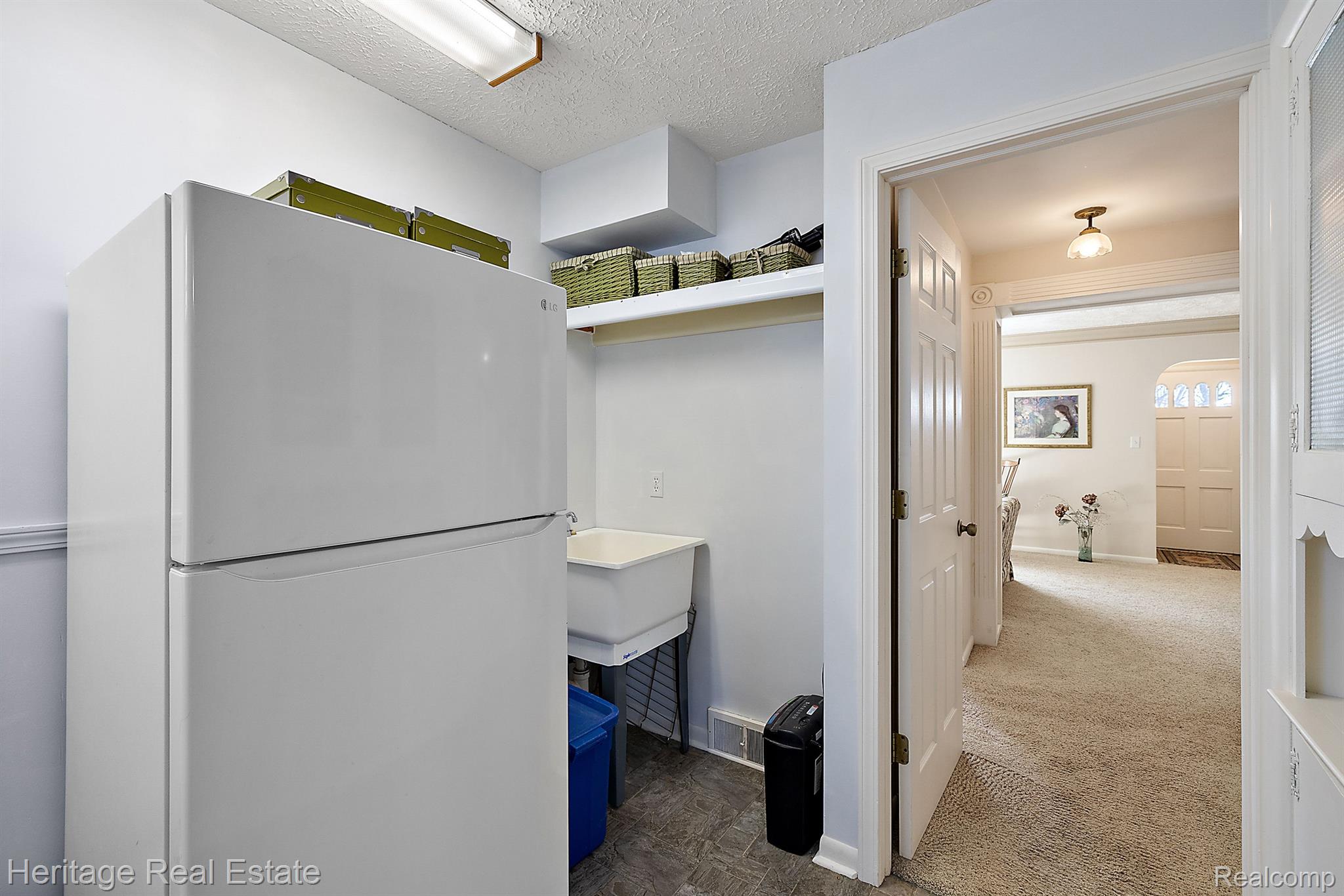 6052 Middle Lake Road Clarkston, MI 48346 - Photo 28 of 47 Mud/laundry room (hookups here and in basement)