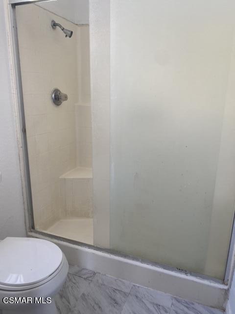 1842 Rory Lane, Unit 7 Simi Valley, CA 93063 - Photo 14 of 19 a bathroom with a toilet and a shower