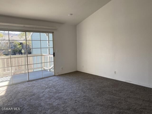 1842 Rory Lane, Unit 7 Simi Valley, CA 93063 - Photo 16 of 19 an empty room with sliding glass door